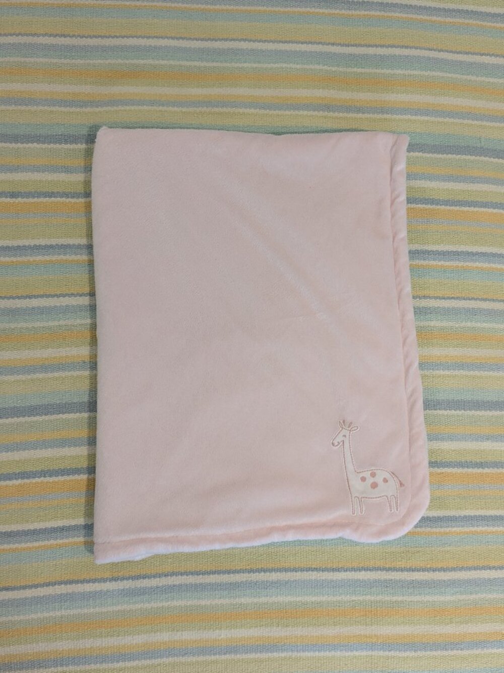 Carter's light pink Giraffe baby blanket